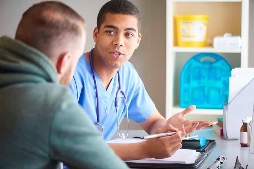 Healthcare professional talking to patient