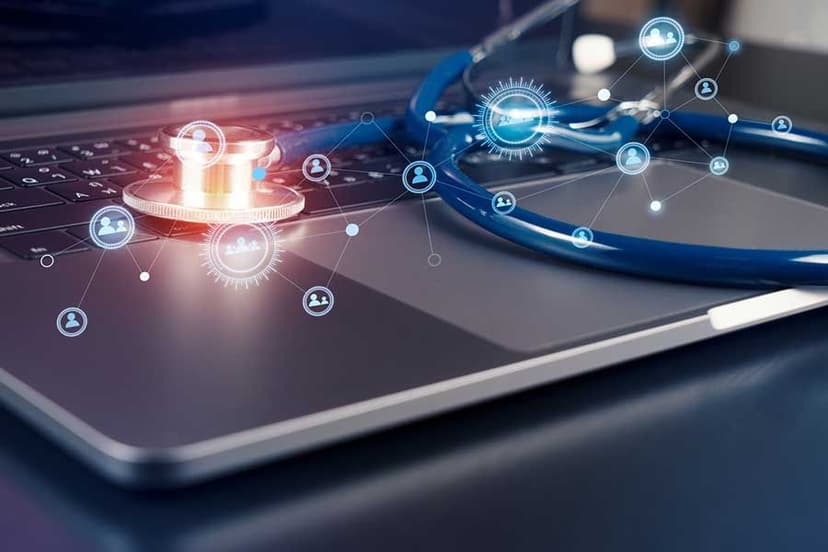 Gleaming stethoscope on laptop
